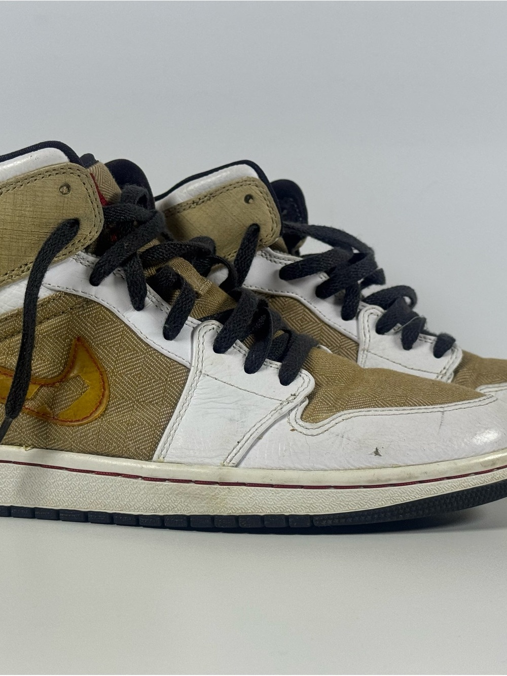 Nike Tan, White & Black High-Top Sneakers with Yellow Swoosh